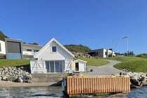 Small holiday house for 4 persons in the south west of Norway, direct at the fjord, motorboat, closed to Preikestolen